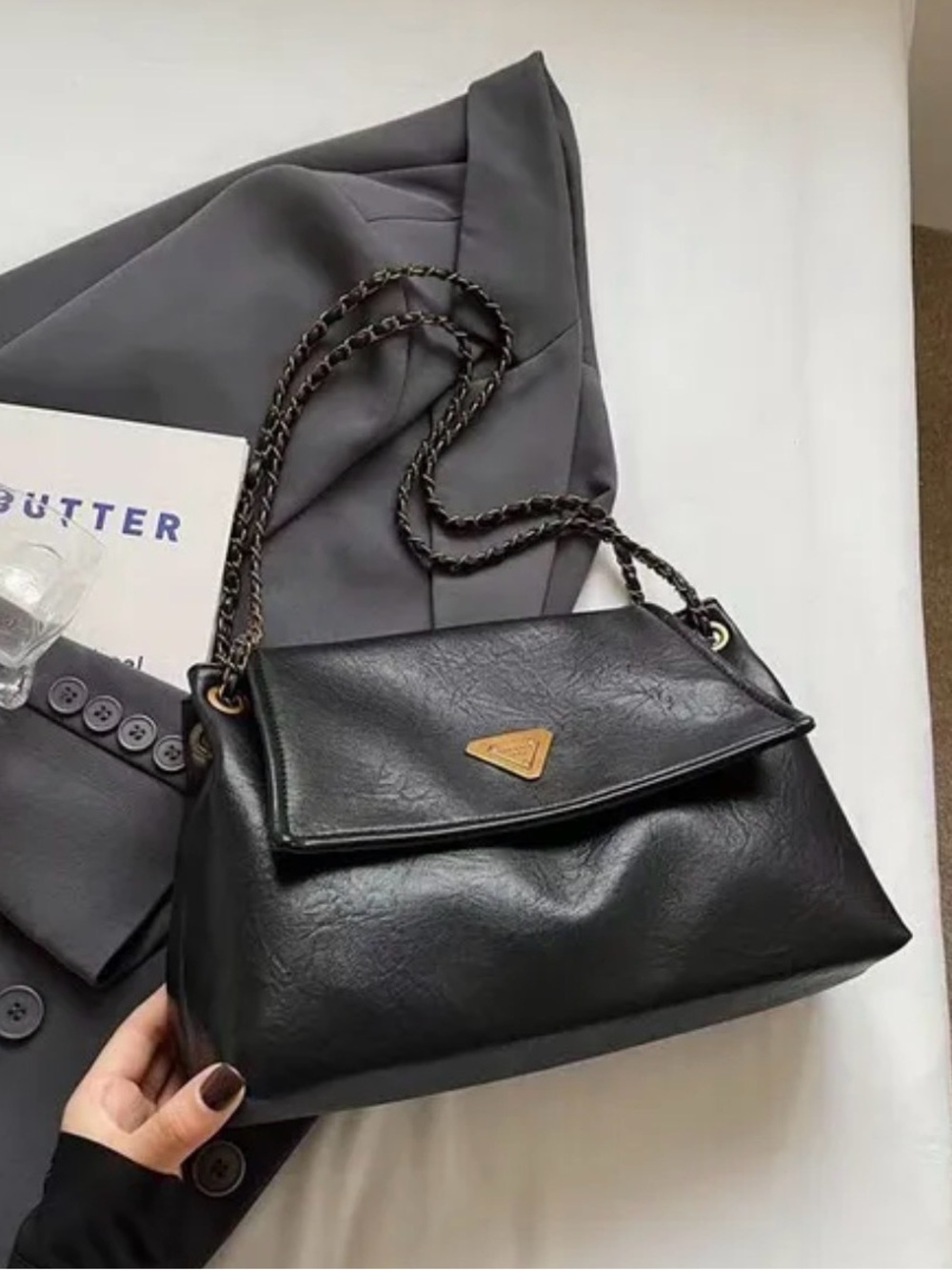 Chic Black Leather Shoulder Bag with Gold Detail